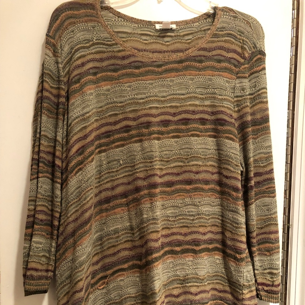 Gently used light weight tunic sweater.  Multi colored